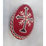 A PRISONER OF WAR BEADWORK DECORATED EGG