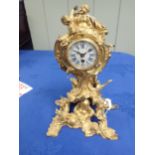 A FRENCH LOUIS XV STYLE ORMOLU CLOCK