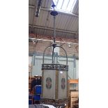 AN EDWARDIAN BRASS FRAMED HALL LANTERN