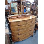 A 19TH CENTURY MAHOGANY BOW-FRONTED CHEST OF DRAWERS