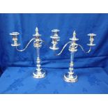 A PAIR OF THREE BRANCHED SILVER PLATED CANDLEABRA