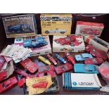 A COLLECTION OF TOY RACING CARS, INCLUDING SCALEXTRIC