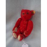 A MODERN STEIFF RED PLUSH TEDDY BEAR