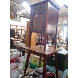 AN EDWARDIAN MAHOGANY BEDSIDE CUPBOARD