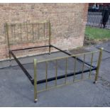 AN EDWARDIAN BRASS BEDSTEAD