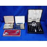 A CASED SET OF SILVER-PLATED SOUP SPOONS AND LADLE