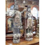 TWO WOODEN PAINTED ASIAN STATUES