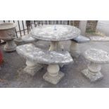 A RECONSTITUTED STONE GARDEN TABLE AND SEATS