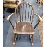 ERCOL: AN EARLY (UTILITY) WINDSOR ROCKING ARMCHAIR