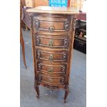 A FRENCH PROVINCIAL STYLE CARVED OAK CHEST OF DRAWERS