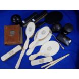 A COLLECTION OF EBONY, IVORY AND OTHER DRESSING TABLE ITEMS