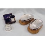 A CASED PAIR OF SILVER NAPKIN RINGS