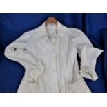 A VINTAGE WHITE COTTON LADIES' COAT