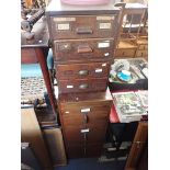 TWO SIMILAR SETS OF 1920S OAK FILING DRAWERS