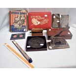 A CASED SET OF DRAWING INSTRUMENTS