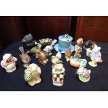 A COLLECTION OF BESWICK BIRDS AND BEATRIX POTTER FIGURES