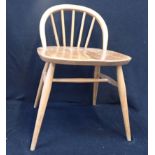 AN ERCOL LOW-BACKED DRESSING/DESK CHAIR, MODEL 414