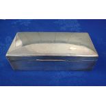 A SILVER CIGARETTE BOX