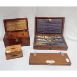 A CASED SET OF DRAWING INSTRUMENTS