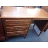 A FRENCH PROVINCIAL STYLE CARVED OAK DESK