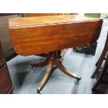 A REGENCY MAHOGANY PEMBROKE TABLE