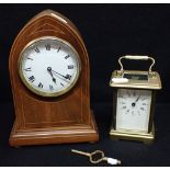 AN EDWARDIAN MAHOGANY CASED MANTEL CLOCK