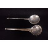 TWO WHITE METAL SPOONS OF ARCHAIC FORM