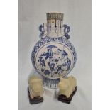 A PAIR OF CARVED JADE OXEN AND A CHINESE BLUE AND WHITE GLAZED MOONFLASK