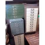A VINTAGE GREEN PAINTED METAL FILING CHEST