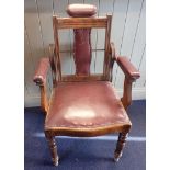 AN EDWARDIAN ADJUSTABLE BARBER'S CHAIR