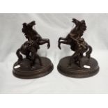 A PAIR OF BRONZED SPELTER 'MARLY' HORSES