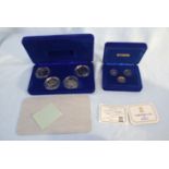 TWO CASED POBJOY MINT COINS SET