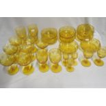 AN EDWARDIAN PART SUITE OF YELLOW DRINKING GLASSES