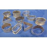 A COLLECTION OF MASONIC SILVER NAPKIN RINGS