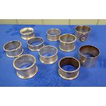 A COLLECTION OF MASONIC SILVER NAPKIN RINGS