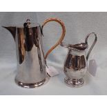 AN ART DECO SILVER-PLATED WATER JUG AND A PLATED CREAM JUG