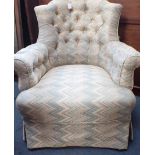 A LATE 19TH CENTURY UPHOLSTERED EASY CHAIR