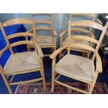 FOUR FRENCH STYLE RUSH-SEATED ARMCHAIRS