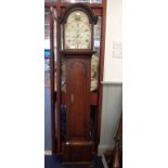 AN OAK LONGCASE CLOCK