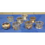 A COLLECTION OF MASONIC SILVER NAPKIN RINGS