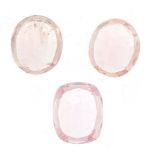 Three Champagne sapphire gemstones, the largest approximately 6mm in length