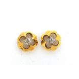 Pair of 9ct gold diamond stud earrings, 8.5mm in diameter, 2.0g