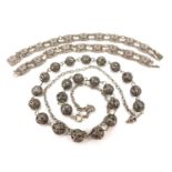 Silver filigree ball necklace and two silver bracelets, 70.4g