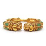 Tibetan gilt metal dragon bangle, 8cm wide