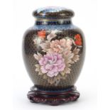 Large Chinese cloisonné ginger jar and cover enamelled with flowers, raised on a carved hardwood