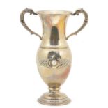 Alwright & Marshal Ltd, Irish silver Celtic design vase with mythical animal head handles, Dublin
