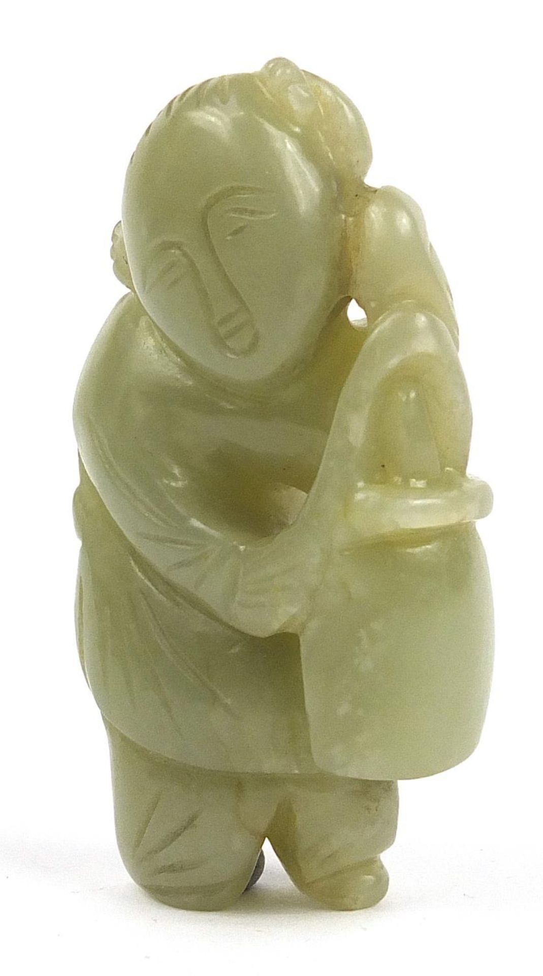 Chinese celadon jade carving of a boy, 7cm high