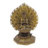 Tibetan gilt bronze figure of Buddha with lotus flower, 29.5cm high