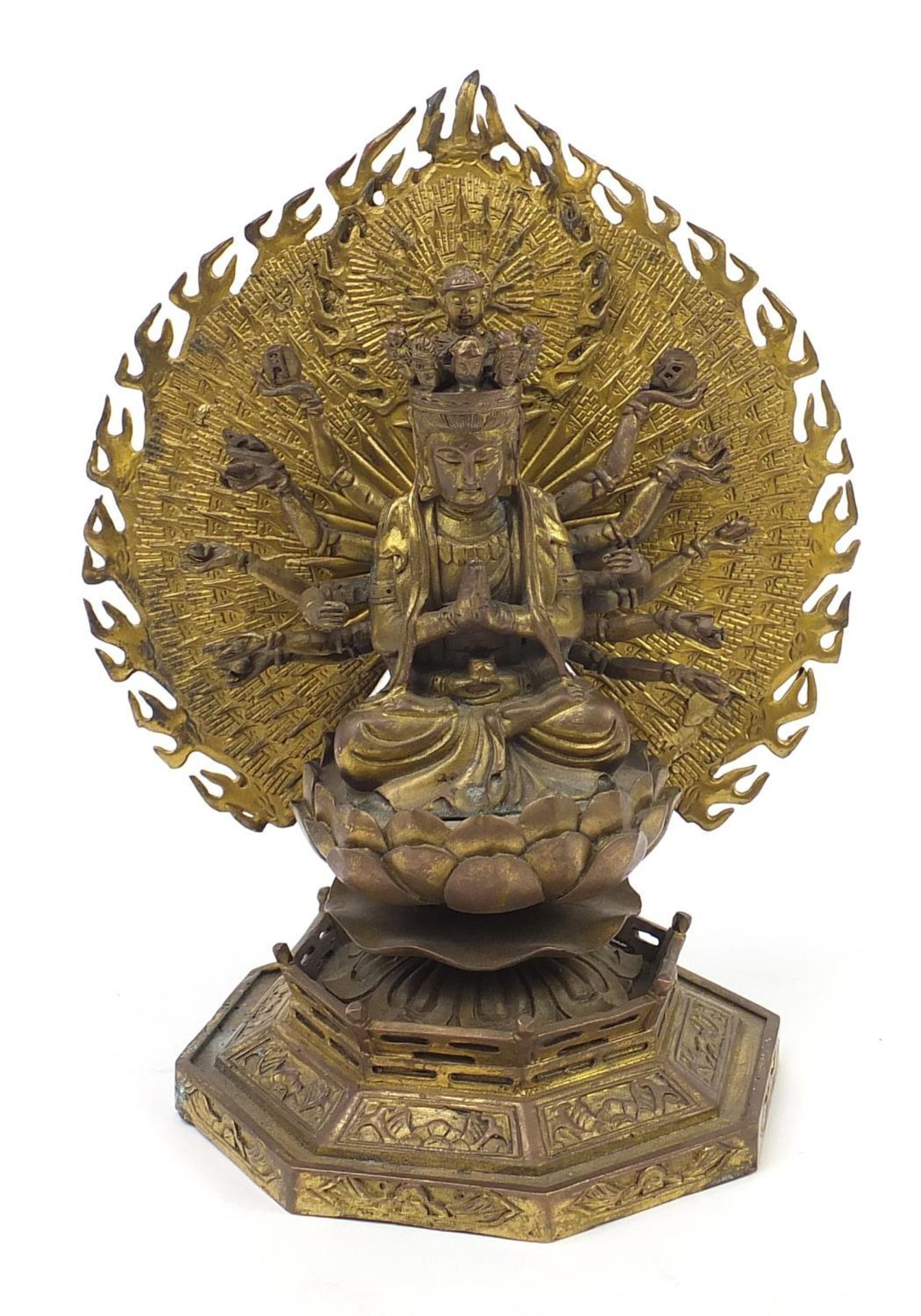 Tibetan gilt bronze figure of Buddha with lotus flower, 29.5cm high