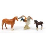 Collectable china animals comprising a Beswick Mallard duck and two Beswick horses, the largest 24cm
